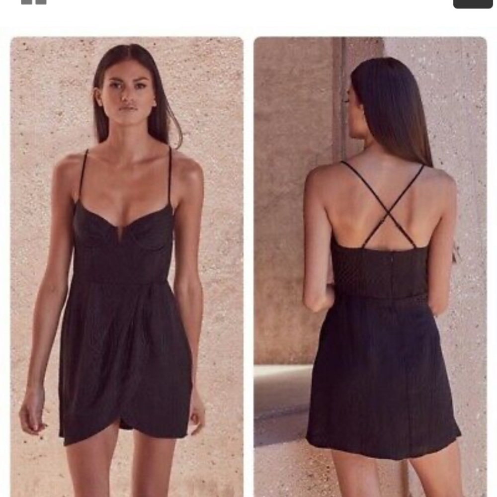 Sun Becomes Her black animal print dress